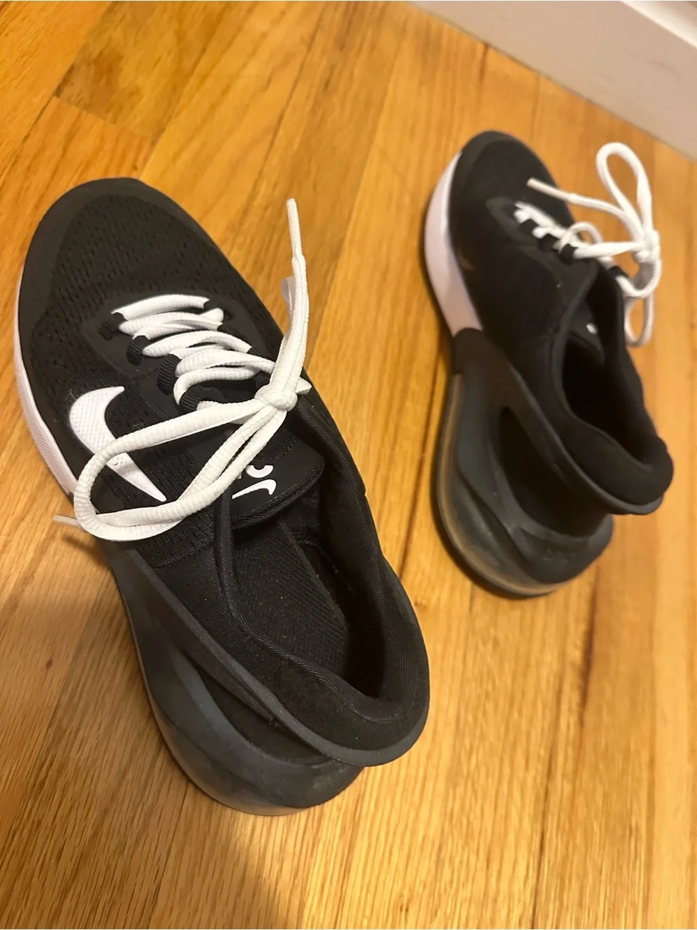 Nike women’s Black and White Sneakers